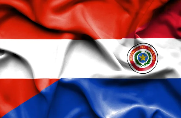 Bandeira ondulante do Paraguai e da Áustria — Fotografia de Stock