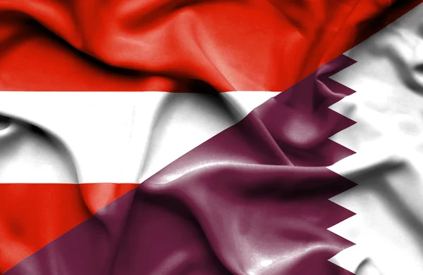 Waving flag of Qatar and Austria — Stock Photo, Image