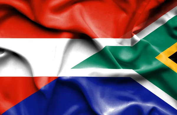 Mávání vlajkou Jihoafrické republiky a Rakouska — Stock fotografie