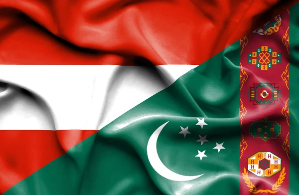 Waving flag of Turkmenistan and Austria — Stock Photo, Image