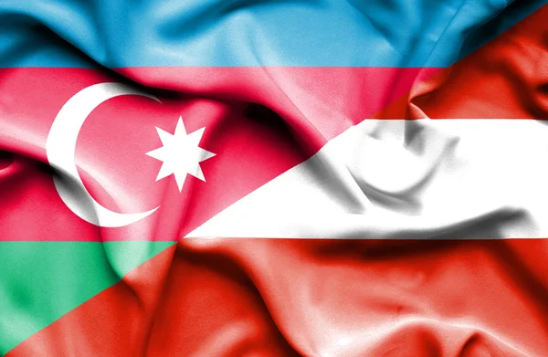 Mávání vlajkou Rakouska a Ázerbájdžán — Stock fotografie