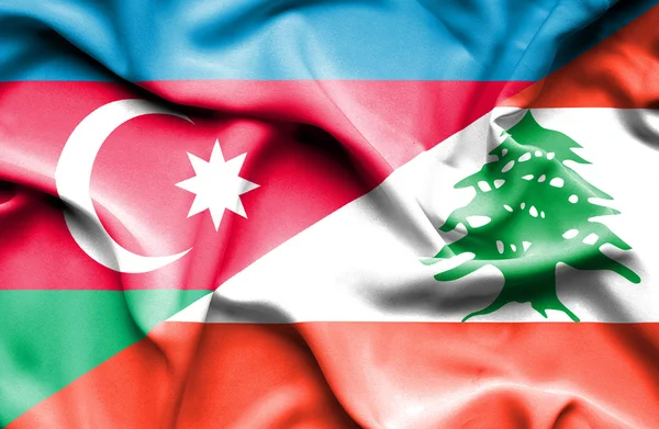 レバノン共和国とアゼルバイジャンの旗を振っています。 — ストック写真