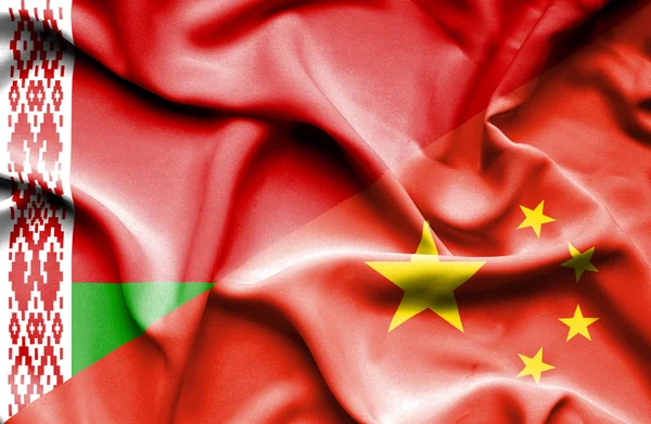 Waving flag of China and Belarus