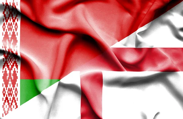 Ondeando la bandera de Inglaterra y Bielorrusia — Foto de Stock