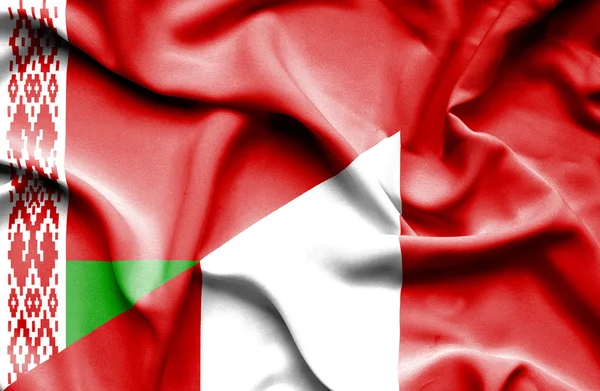 Wapperende vlag van Peru en Wit-Rusland — Stockfoto