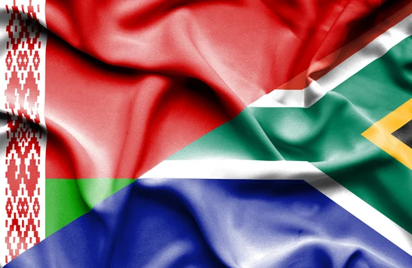 Waving flag of South Africa and Belarus — Stock Photo, Image