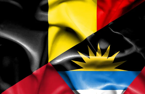 Wapperende vlag van Antigua en Barbuda en België — Stockfoto