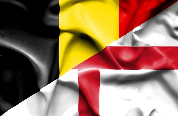 Flagge von England und Belgien schwenken — Stockfoto