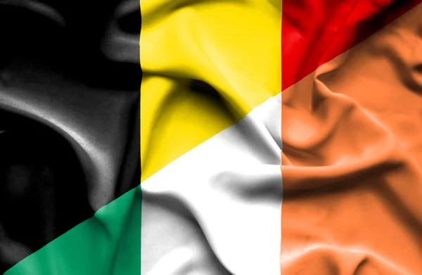 Waving flag of Ireland and Belgium — Stock Photo, Image