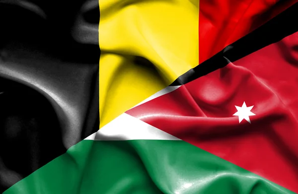 Flagge von Jordanien und Belgien schwenken — Stockfoto