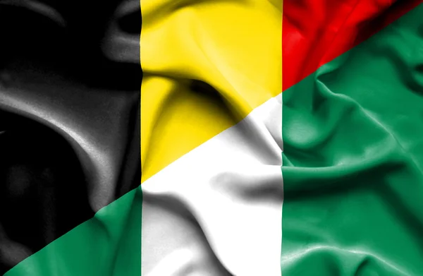 Waving flag of Nigeria and Belgium — Stock Photo, Image