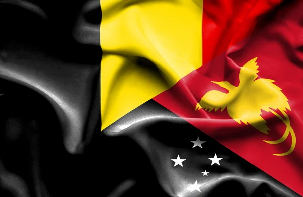 Vlající vlajka Papuy-Nové Guineje a Belgie — Stock fotografie