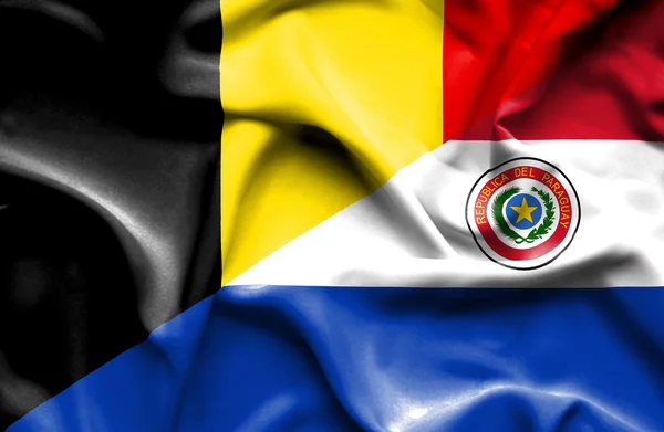 Waving flag of Paraguay and Belgium — Stock Photo, Image