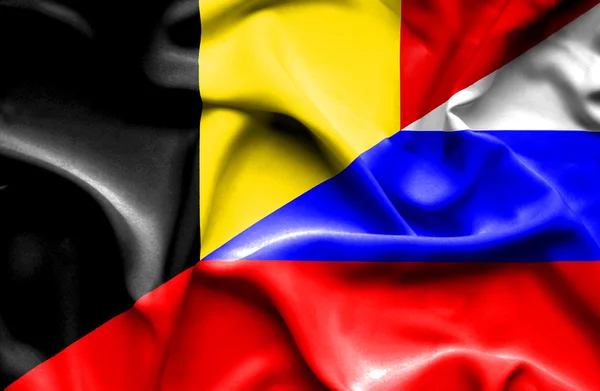 Flagge Russlands und Belgiens schwenkend — Stockfoto