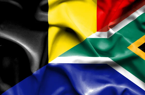 Waving flag of South Africa and Belgium — Stock Photo, Image