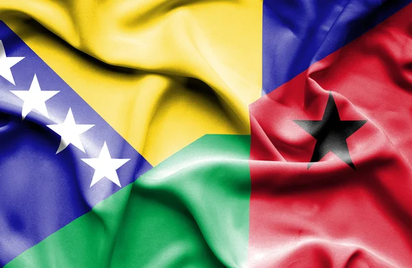 Waving flag of Guinea Bissau and Bosnia and Herzegovina — Stock Photo, Image