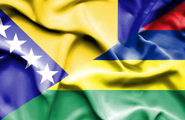 Waving flag of Mauritius and Bosnia and Herzegovina — Stock Photo, Image