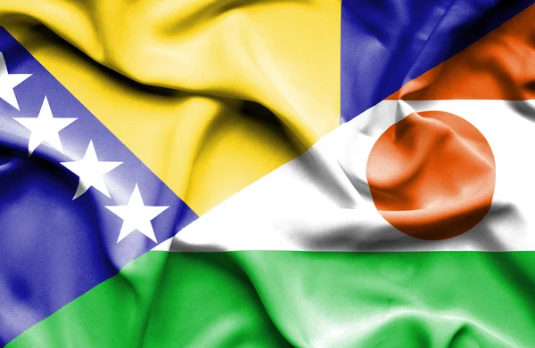 Waving flag of Niger and Bosnia and Herzegovina — Stock Photo, Image