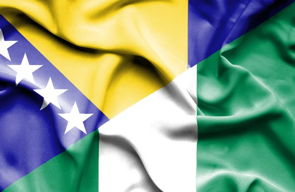 Bandiera sventolante di Nigeria e Bosnia-Erzegovina — Foto Stock