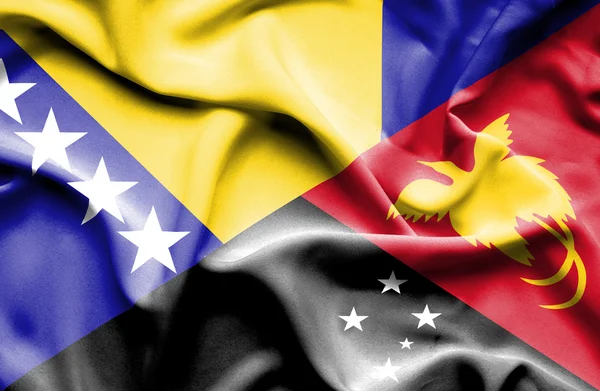 Viftande flagga Papua Nya Guinea och Bosnien och Hercegovina — Stockfoto