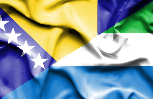 Waving flag of Sierra Leone and Bosnia and Herzegovina — Stock Photo, Image