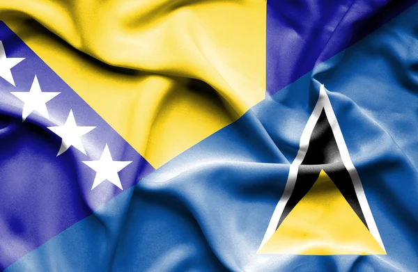 Waving flag of St Lucia and Bosnia and Herzegovina — Stock Photo, Image