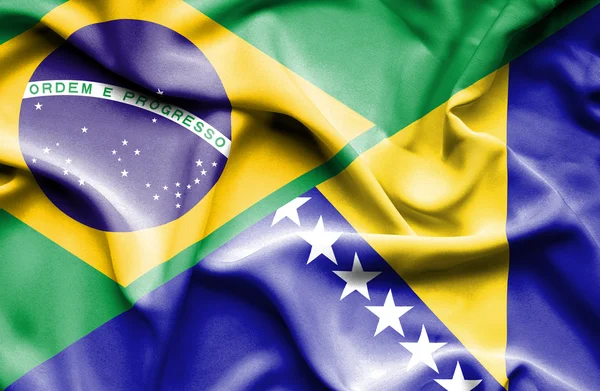 Waving flag of Bosnia and Herzegovina and Brazil — Stock Photo, Image