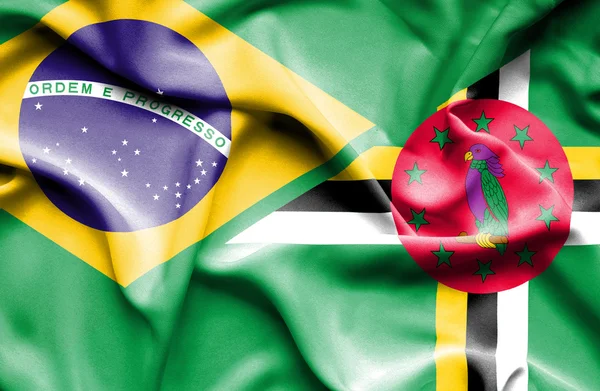 Bandeira acenando de Dominica e Brasil — Fotografia de Stock