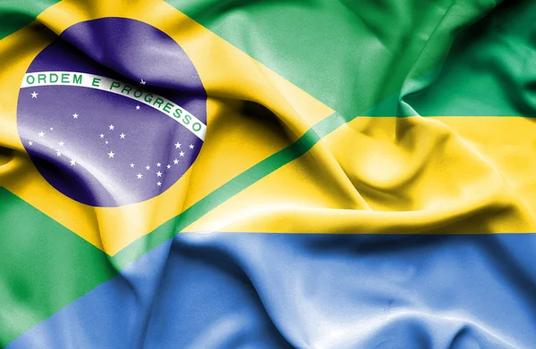 Waving flag of Gabon and Brazil — Stock Photo, Image