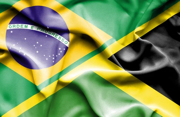 Flagge von Jamaika und Brasilien schwenken — Stockfoto