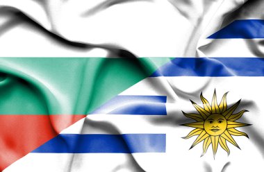 Uruguay ve Bulgaristan bayrağı sallayarak