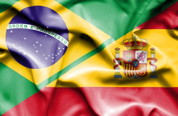 Wapperende vlag van Spanje en Brazilië — Stockfoto