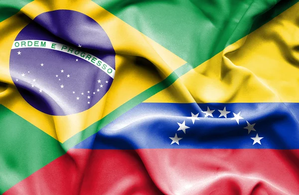 Waving flag of Venezuela and Brazil — Stock Photo, Image