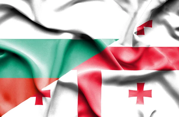 Gürcistan ve Bulgaristan bayrağı sallayarak — Stok fotoğraf