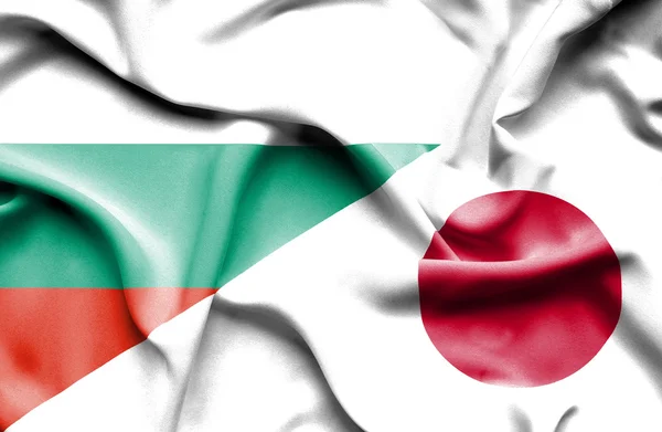 Wapperende vlag van Japan en Bulgarije — Stockfoto