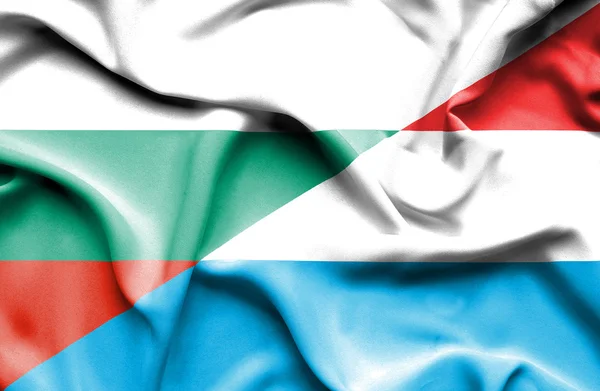 Bandeira ondulada do Luxemburgo e da Bulgária — Fotografia de Stock