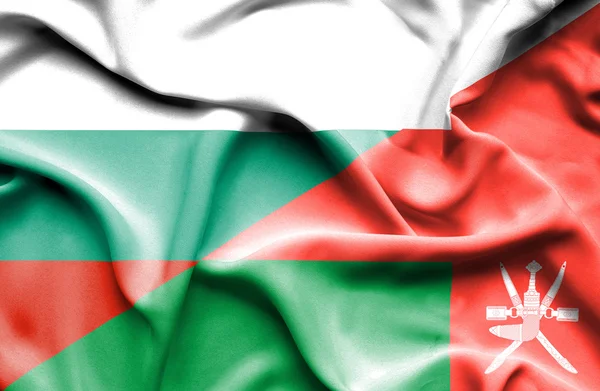 阿曼和保加利亚那飘扬的旗帜 — 图库照片
