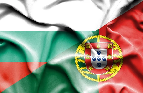 Waving flag of Portugal and Bulgaria — Stock Photo, Image