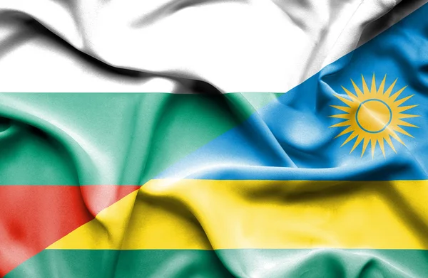 Flagge Ruandas und Bulgariens schwenken — Stockfoto