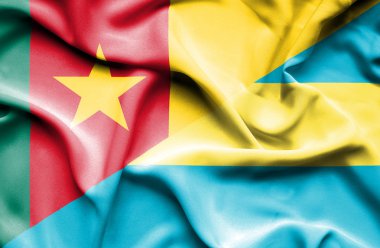 Bahamalar ve Kamerun bayrağı sallayarak