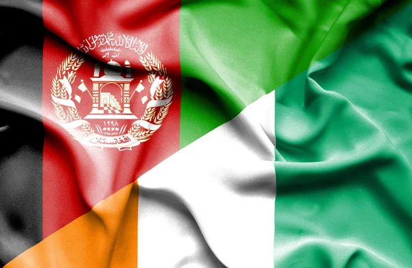 Waving flag of Ivory Coast and Afghanistan — Stock Photo, Image