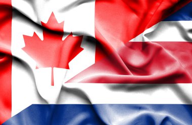 Kosta Rika ve Kanada bayrağı sallayarak