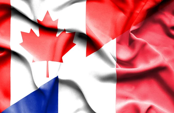 Sventolando bandiera di Francia e Canada — Foto Stock