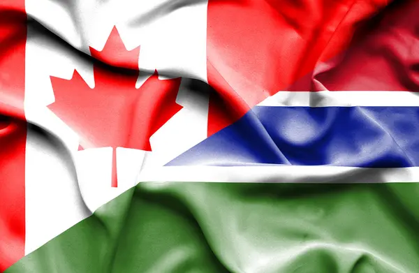 Bandeira acenando de Gâmbia e Canadá — Fotografia de Stock