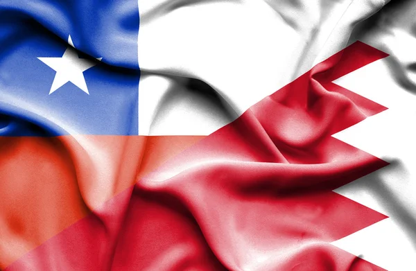 Waving flag of Bahrain and Chile — Stock Photo, Image