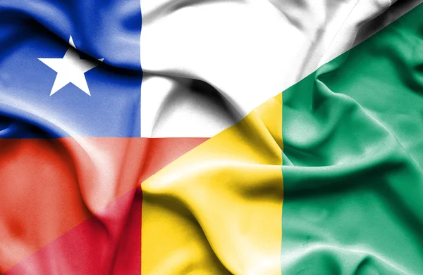 Waving flag of Guinea and Chile — Stock Photo, Image