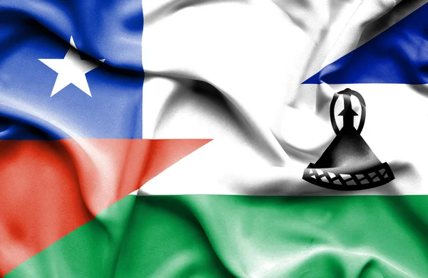 Waving flag of Lesotho and Chile — Stock Photo, Image