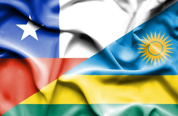 Flagge Ruandas und Chiles schwenken — Stockfoto
