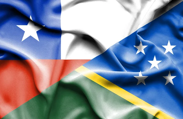 Waving flag of Solomon Islands and Chile — Stock Photo, Image