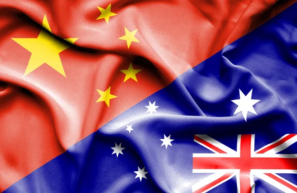 中国与澳大利亚的那飘扬的旗帜 — 图库照片